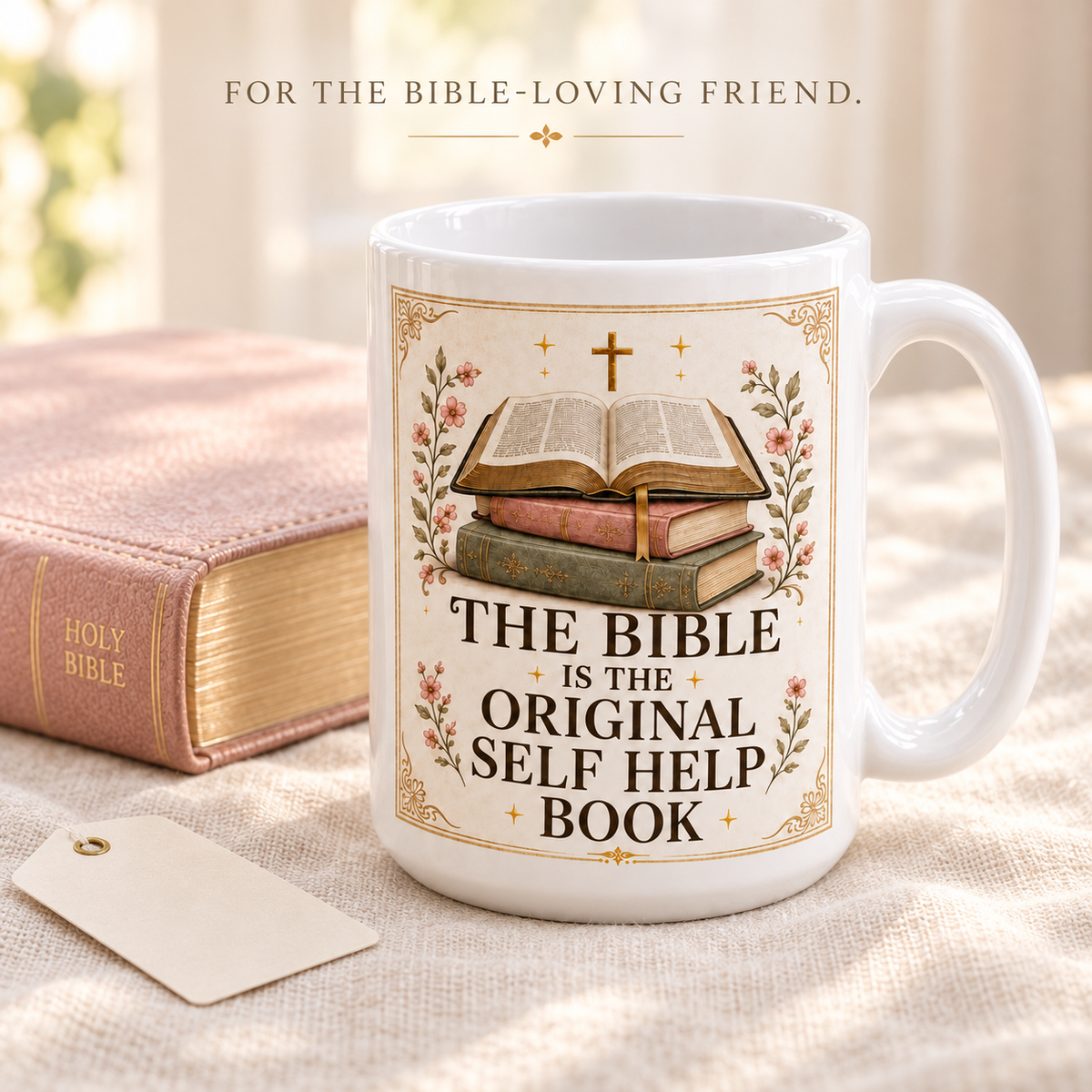 Vintage-inspired Christian mug beside a Bible and a small gift tag on an ivory tabletop