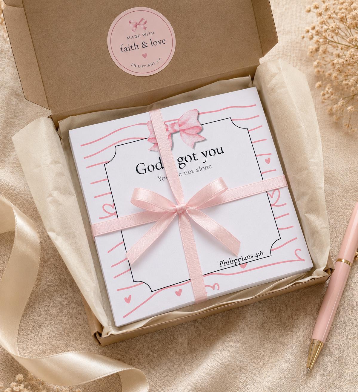 God's Got You Christian notepad arranged as an encouragement gift for women