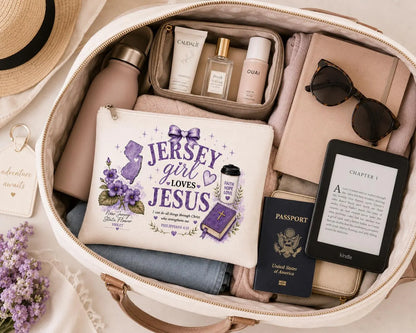 Bible verse makeup bag packed inside a suitcase for travel organization